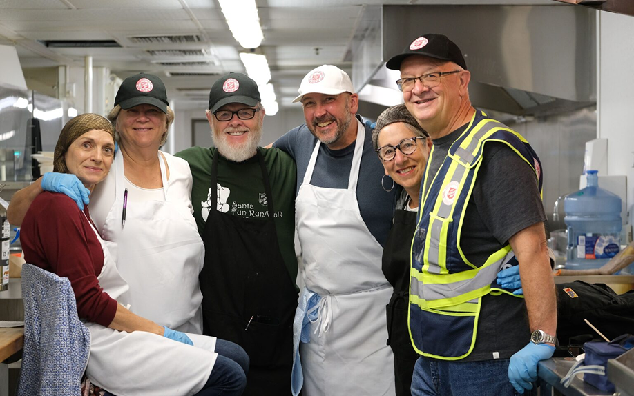 A group of volunteers smiling