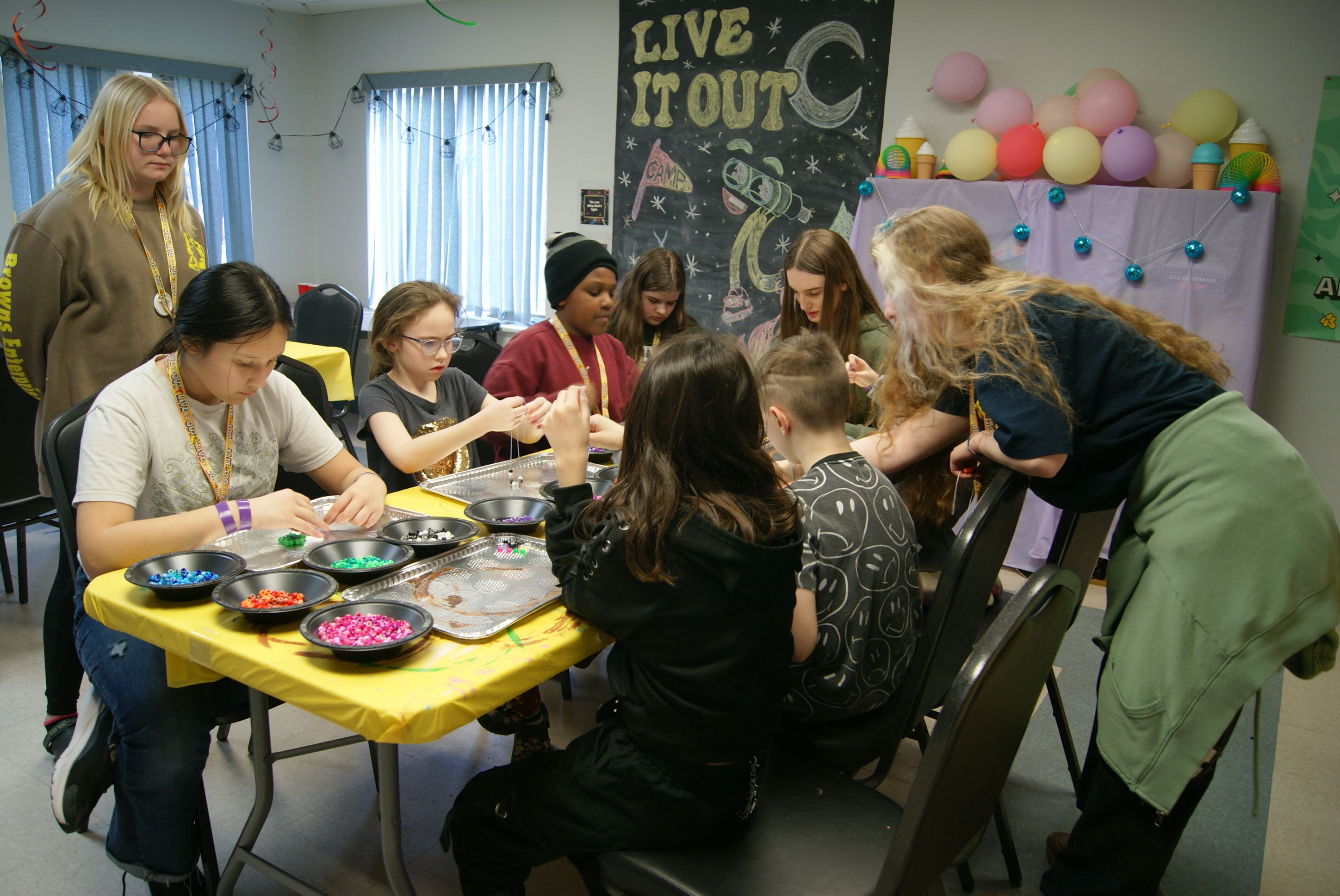 Camp participants engage in crafts